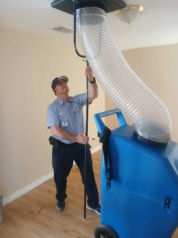 Furnace Tune-Up technician using HEPA equipment in Wickenburg